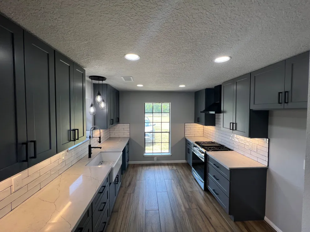 Galley kitchen remodel in Alvin, TX with smart storage and upgraded lighting