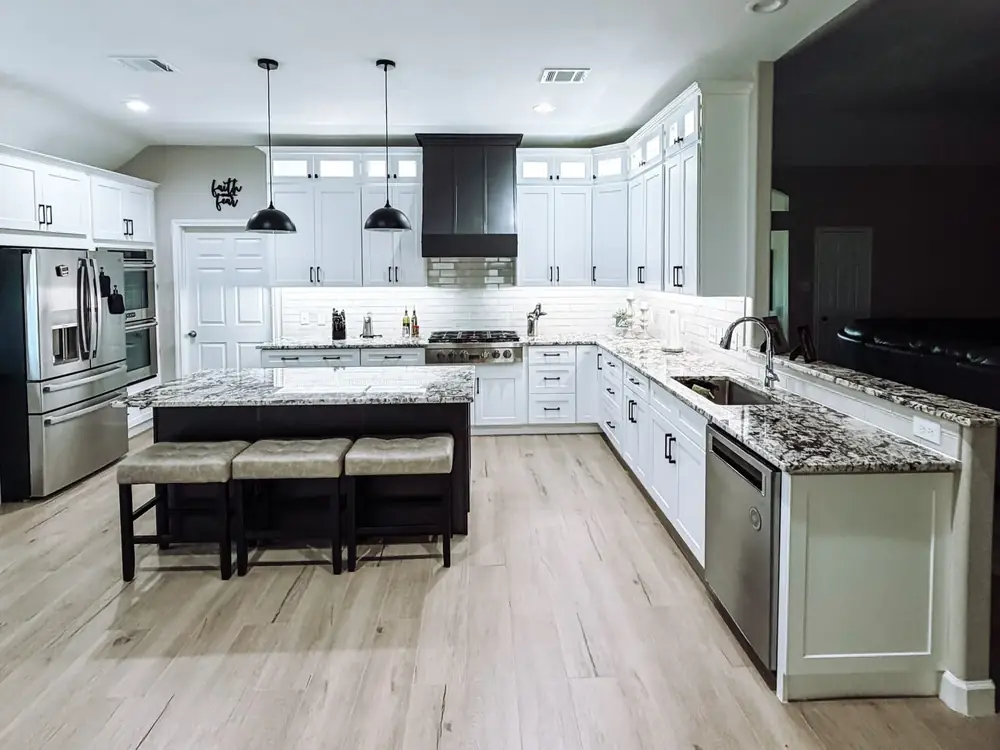 Kitchen expansion renovation in Alvin, TX with relocated walls and open floor plan